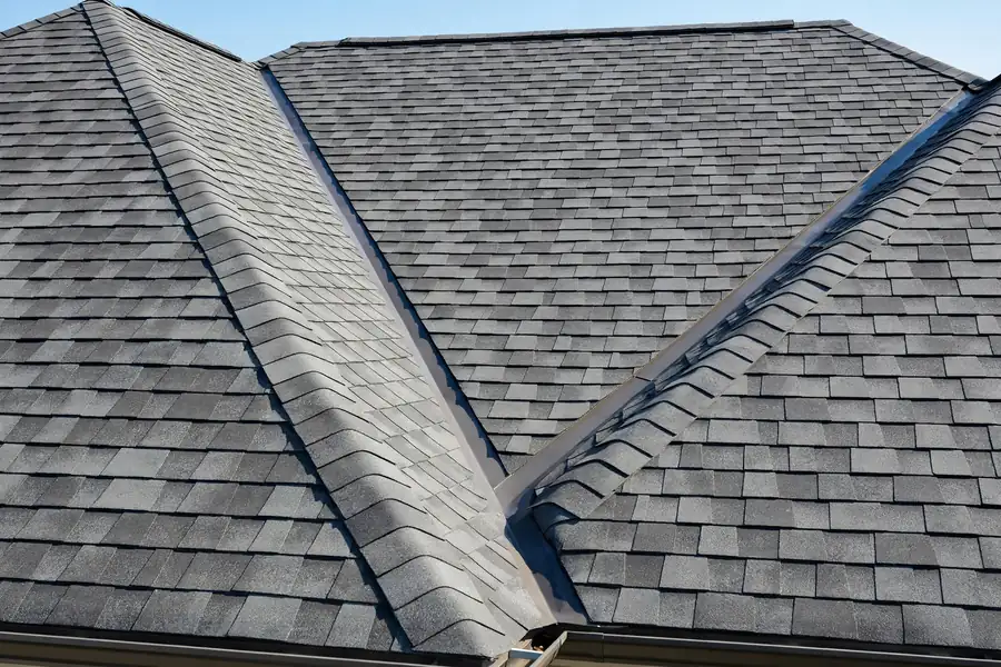 Well-maintained roof with clean shingles after maintenance